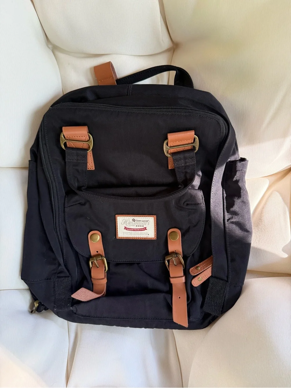 Amazon Black Canvas Backpack with Brown Accents